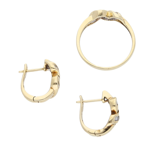 Juego de anillo y aretes diseño especial con diamantes en oro amarillo 14 kilates.