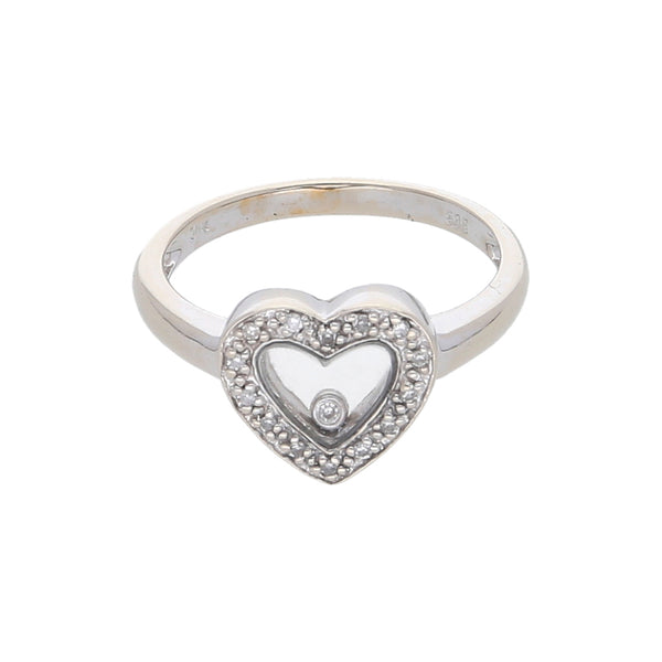 Anillo diseño especial motivo corazón con diamantes en oro blanco 14 kilates.