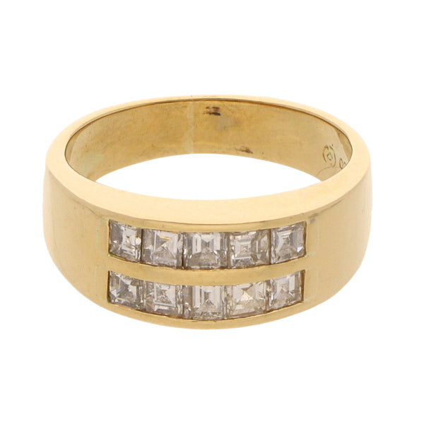 Anillo estilizado con diamantes en oro amarillo 18 kilates.