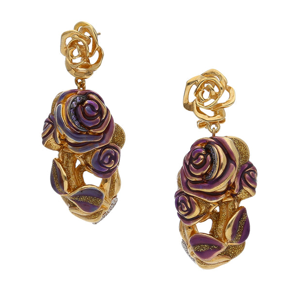 Aretes huecos con colgante motivo floral con esmalte en oro dos tonos 14 kilates.