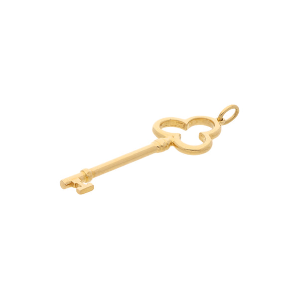 Dije diseño especial motivo llave firma Tiffany & Co. en oro amarillo 18 kilates.