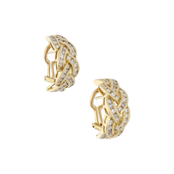 Aretes calados con diamantes en oro amarillo 14 kilates.