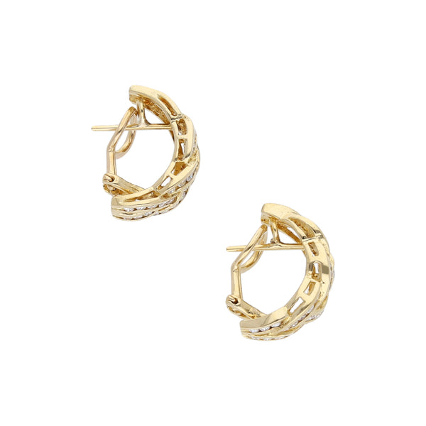 Aretes calados con diamantes en oro amarillo 14 kilates.