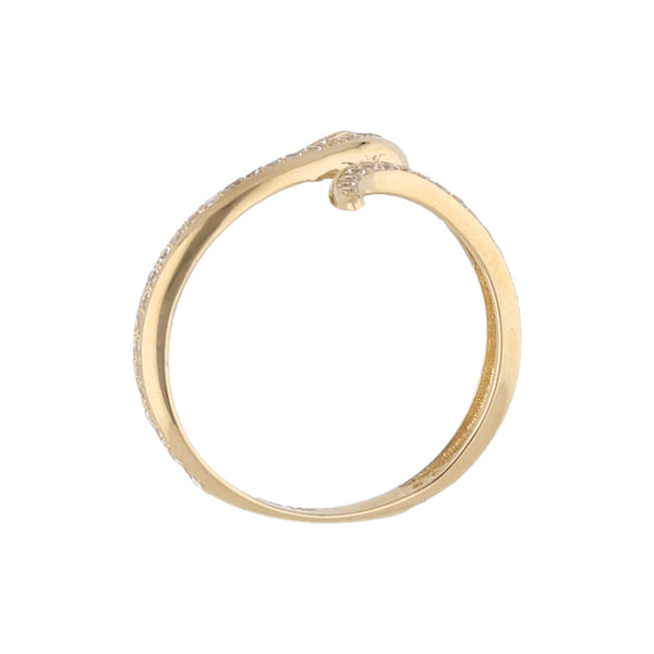 Anillo estilizada motivo serpiente con sintéticos en oro amarillo 14 kilates.