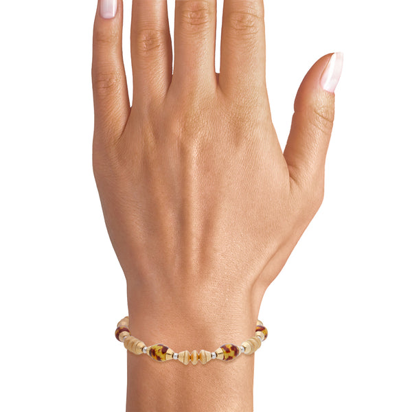 Pulsera eslabón combinado con esmalte en oro dos tonos 14 kilates.