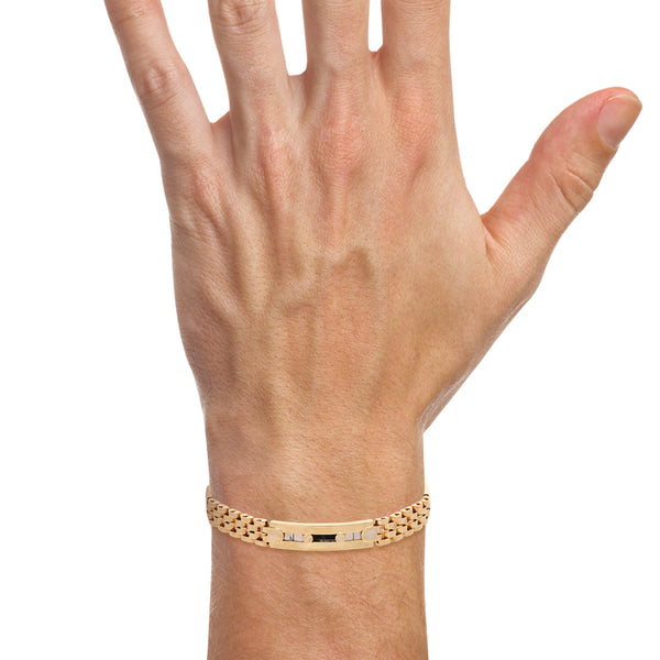 Pulsera eslabón articulado combinado motivo tornillos simulados con sintéticos en oro dos tonos 14 kilates.