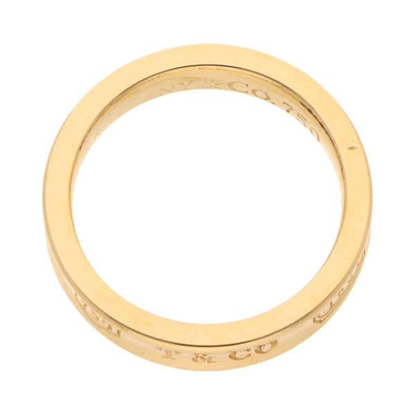 Argolla diseño especial firma Tiffany & Co. en oro amarillo 18 kilates.