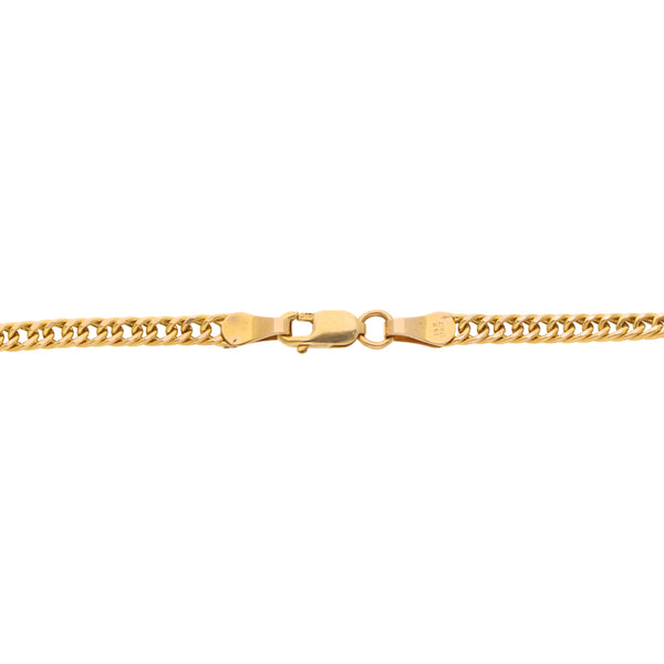 Pulsera eslabón barbado diamantado, dije hueco motivo corazón en oro amarillo 14 kilates.