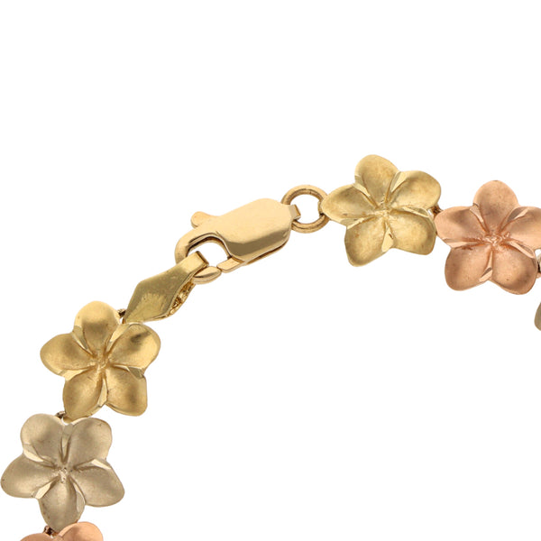 Pulsera eslabón articulado motivo floral en oro tres tonos 14 kilates.