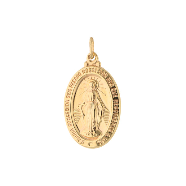 Medalla diseño especial en oro amarillo 14 kilates.