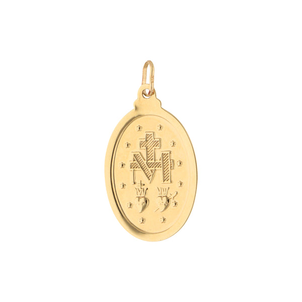 Medalla diseño especial en oro amarillo 14 kilates.