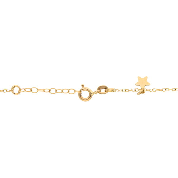 Juego de pulsera eslabón cruzado con dijes y broqueles con colgantes motivo estrellas en oro amarillo 14 kilates.