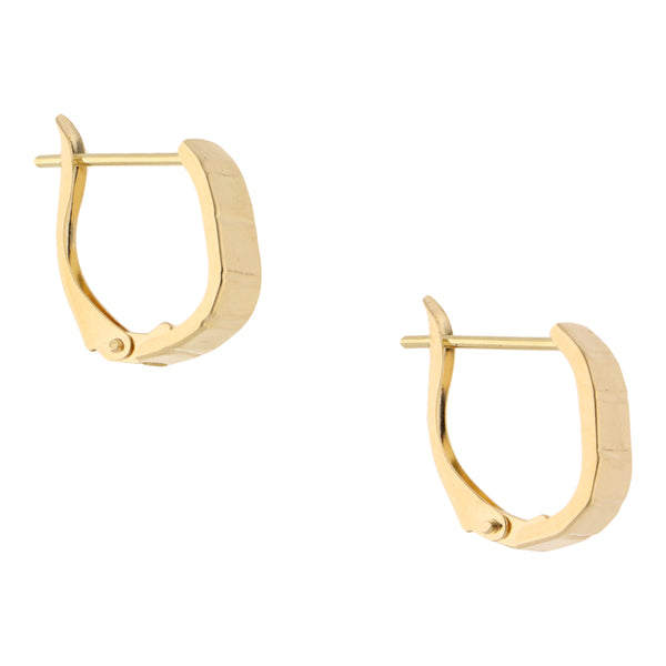 Aretes laminados en oro amarillo 14 kilates.