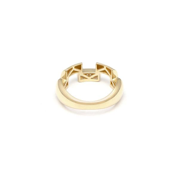 Anillo calado con sintéticos en oro amarillo 14 kilates.