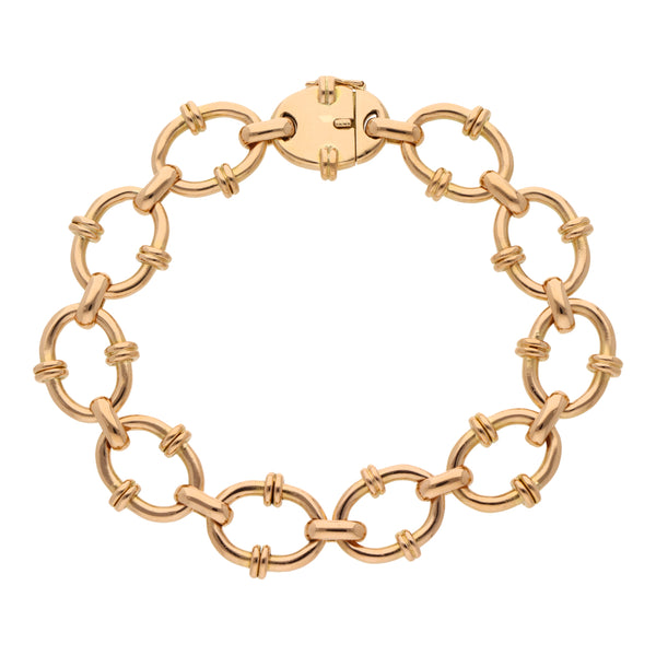 Pulsera eslabón cruzado combinado en oro amarillo 18 kilates.