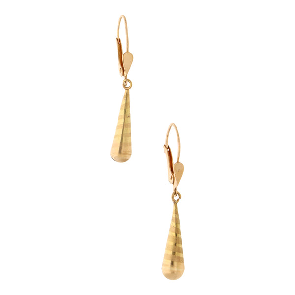 Aretes con colgantes huecos en oro amarillo 18 kilates.