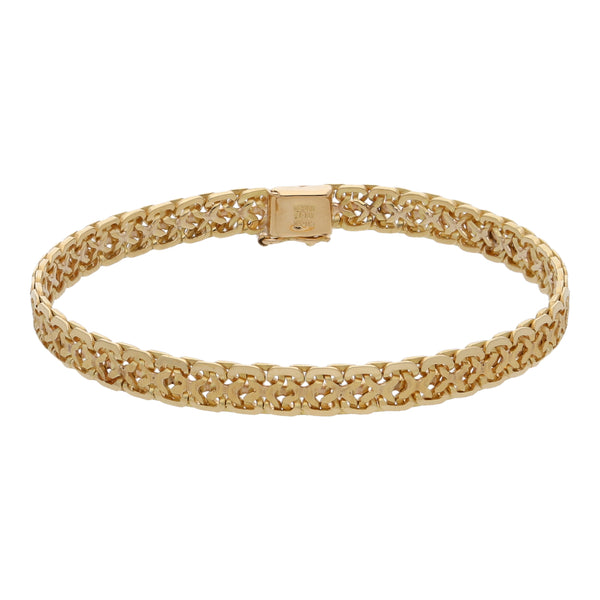 Pulsera labrada eslabón calado en oro amarillo 18 kilates.