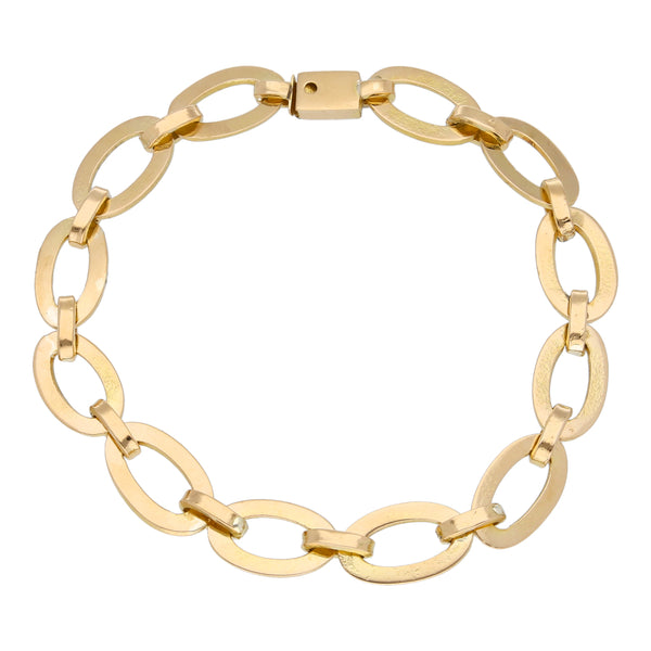 Pulsera eslabón combinado cruzado en oro amarillo 18 kilates.