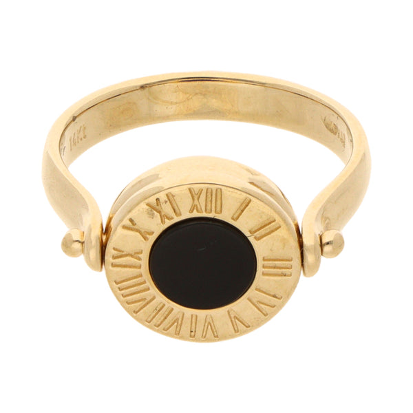 Anillo giratorio con sintéticos en oro amarillo 14 kilates.