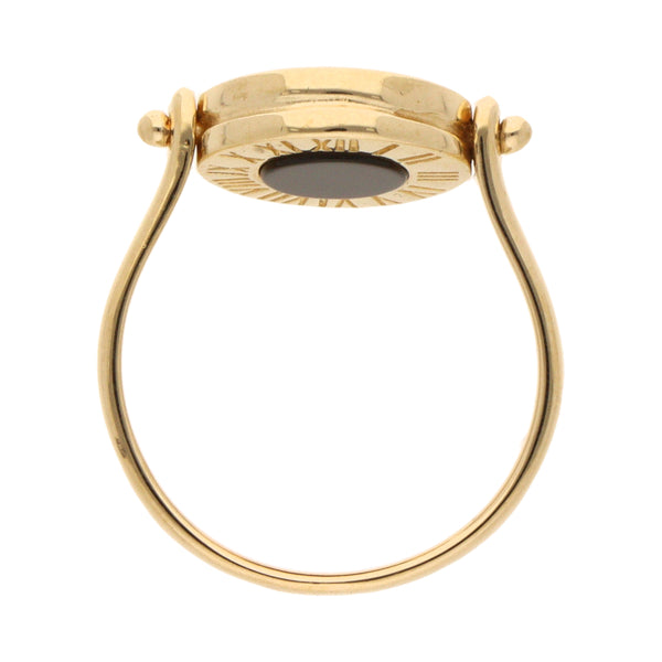 Anillo giratorio con sintéticos en oro amarillo 14 kilates.