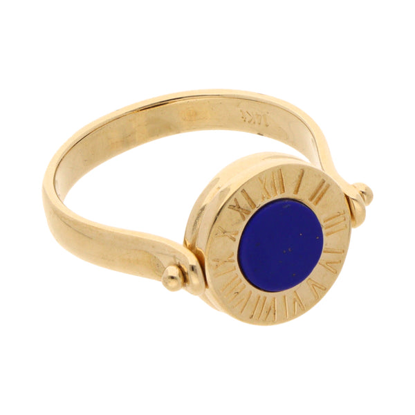 Anillo giratorio con sintéticos en oro amarillo 14 kilates.