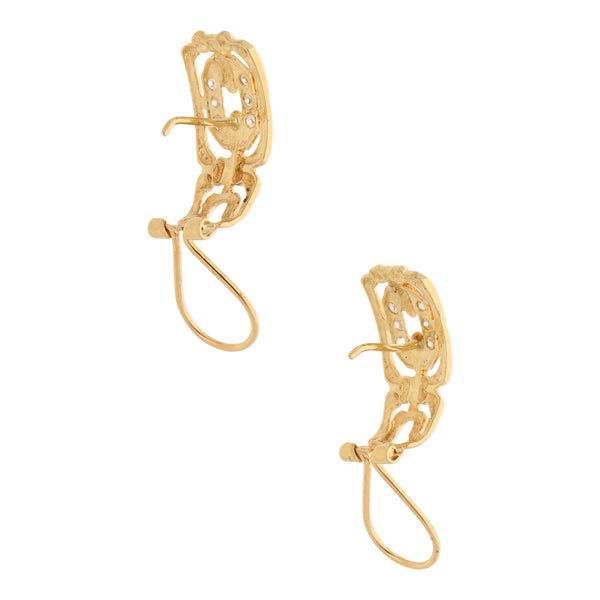 Aretes calados con circonias en oro amarillo 18 kilates.