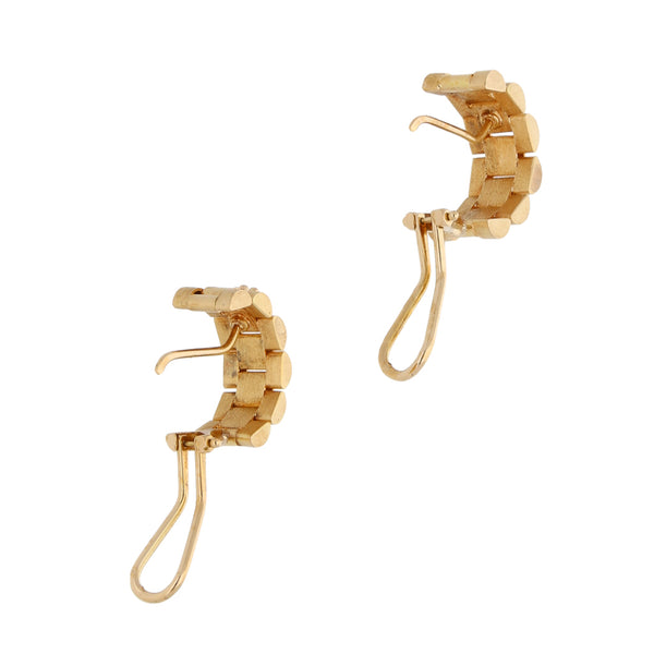 Aretes diseño especial en oro amarillo 18 kilates.