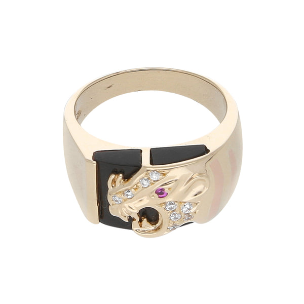 Anillo diseño especial motivo felino con ónix y sintéticos en oro dos tonos 14 kilates.