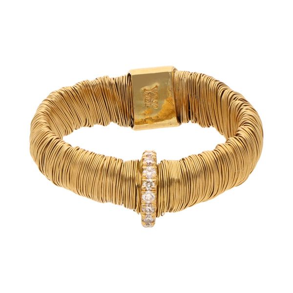 Anillo flexible con diamantes en oro amarillo 18 kilates.