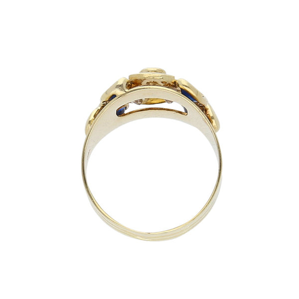 Anillo diseño especial con sintéticos en oro amarillo 14 kilates.