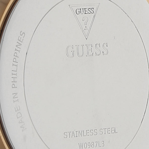 Reloj Guess para dama en acero chapa.