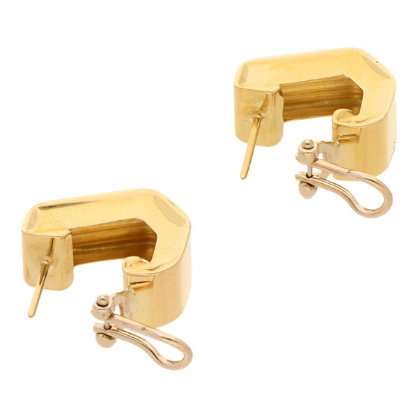 Aretes acanalados laminados en oro dos tonos 18 kilates.