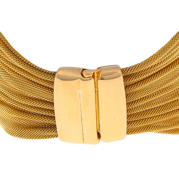 Pulsera eslabón tejido fino firma Tous en oro amarillo 18 kilates.