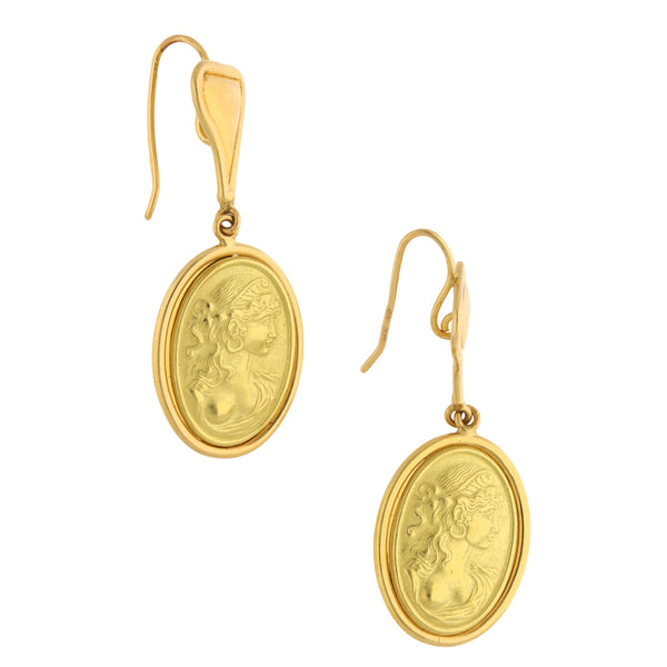 Aretes articulados motivo mujer en oro amarillo 18 kilates.