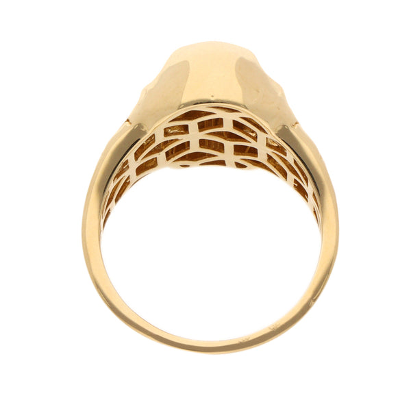 Anillo estilizado con esmalte motivo calavera en oro amarillo 14 kilates.