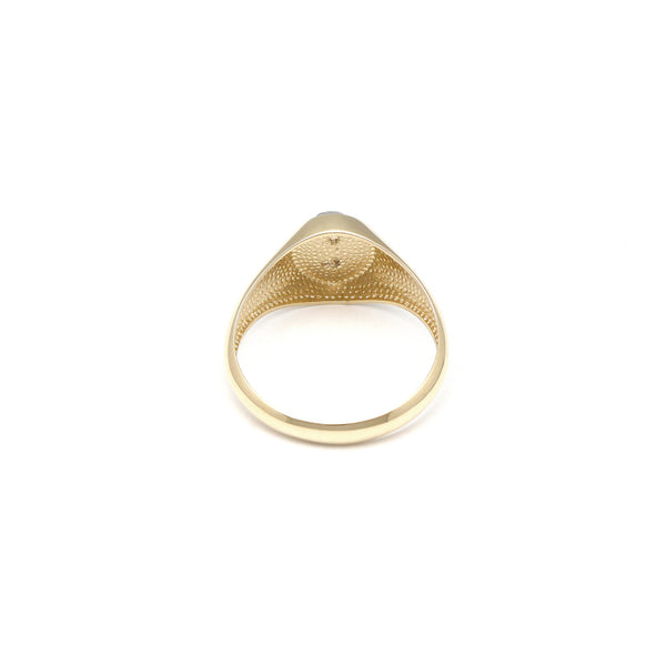 Anillo tipo sello motivo calavera en oro dos tonos 14 kilates.