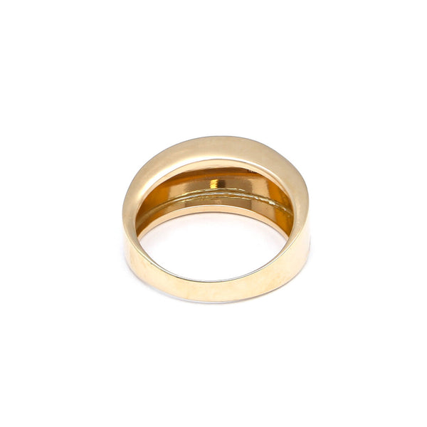 Anillo liso en oro amarillo 14 kilates.