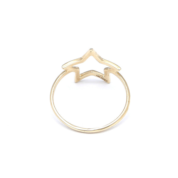 Anillo calado motivo estrella en oro amarillo 14 kilates.