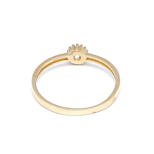 Anillo solitario con circonia en oro amarillo 14 kilates.