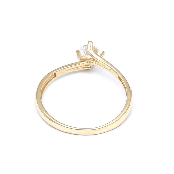 Anillo estilizado con circonia en oro amarillo 14 kilates.