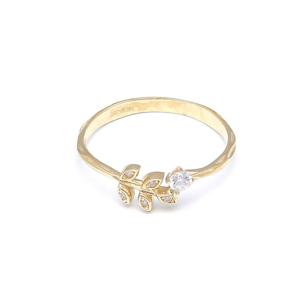 Anillo labrado motivo floral con circonias en oro amarillo 14 kilates.