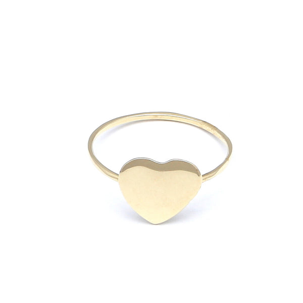 Anillo tipo sello motivo corazón en oro amarillo 14 kilates.