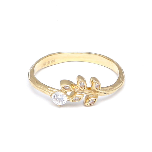 Anillo labrado motivo floral con circonias en oro amarillo 14 kilates.