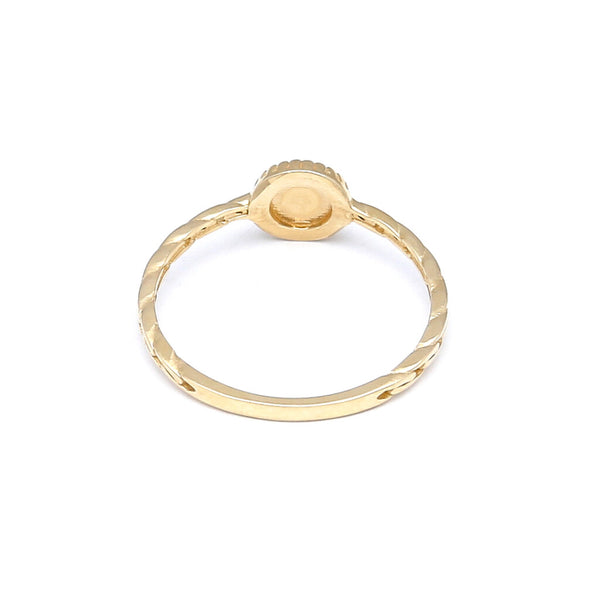 Anillo calado con medre perla en oro amarillo 14 kilates.