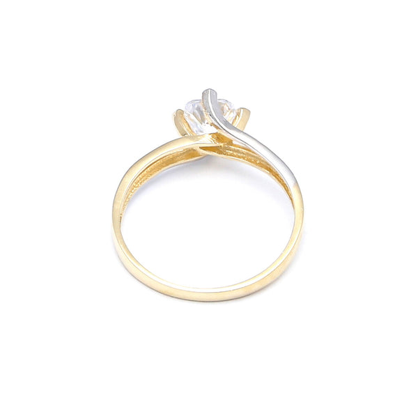 Anillo estilizado con circonia en oro amarillo 14 kilates.