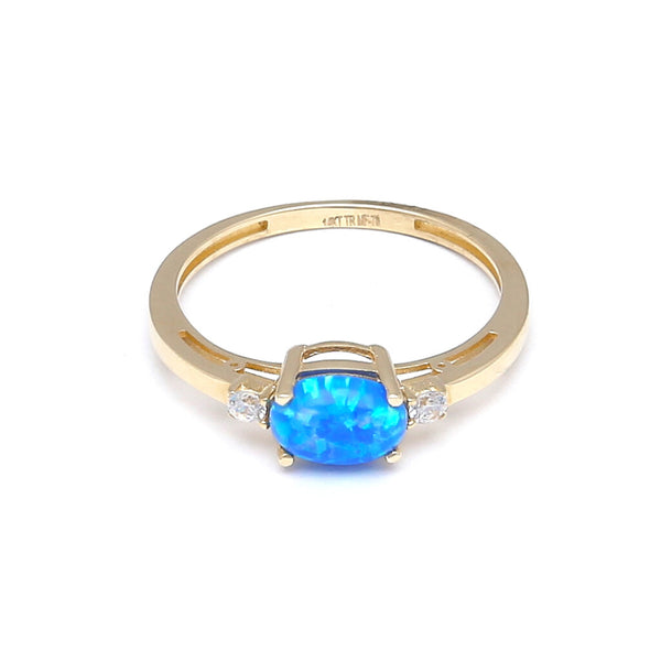 Anillo calado con sintéticos en oro amarillo 14 kilates.