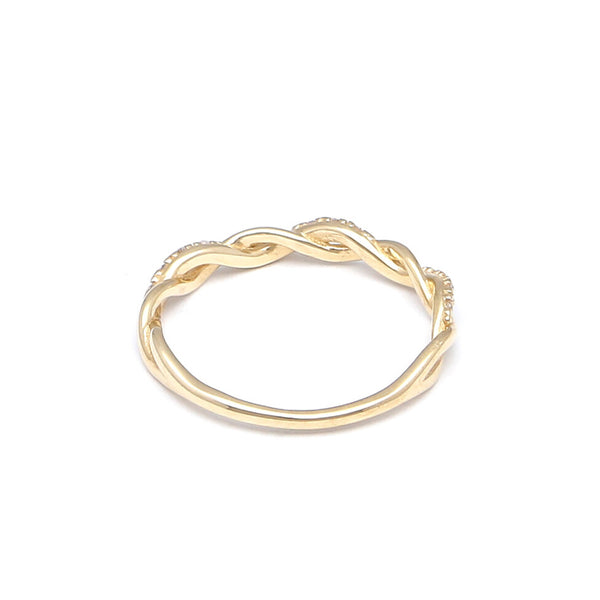 Anillo calado con circonias en oro amarillo 14 kilates.