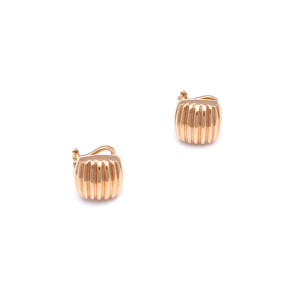 Aretes huecos en oro rosa 14 kilates.