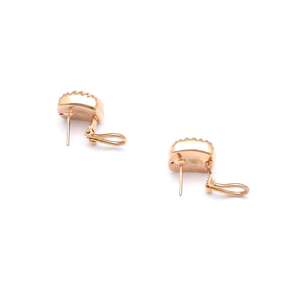 Aretes huecos en oro rosa 14 kilates.