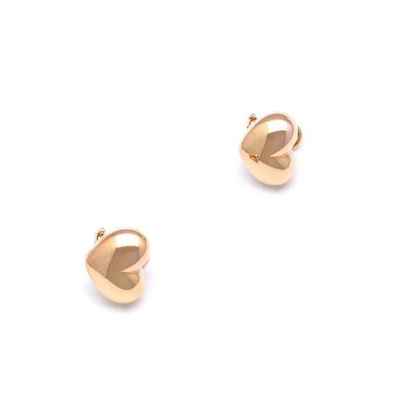 Aretes huecos motivo corazón en oro rosa 14 kilates.